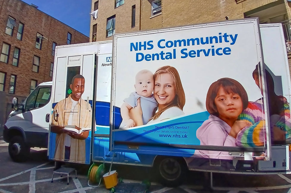 NHS mobile dental clinic van parked outside Mildmay Hospital