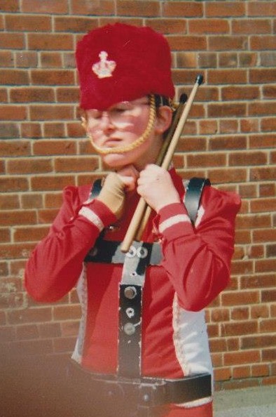 A girl in a red uniform