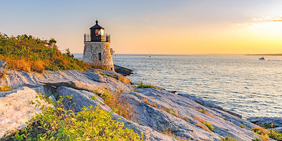 Castle Hill Lighthouse at twilight during the golden hour just before sunset, Newport, Rho