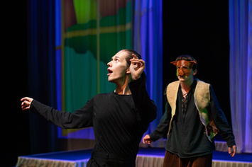 Opera singer performing on stage in Bedford – live performance photography capturing emotion