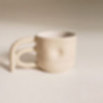 Thumbnail: Holding Mug