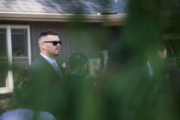 Tecumseh couple celebrating post-ceremony with champagne — book your photographer online.