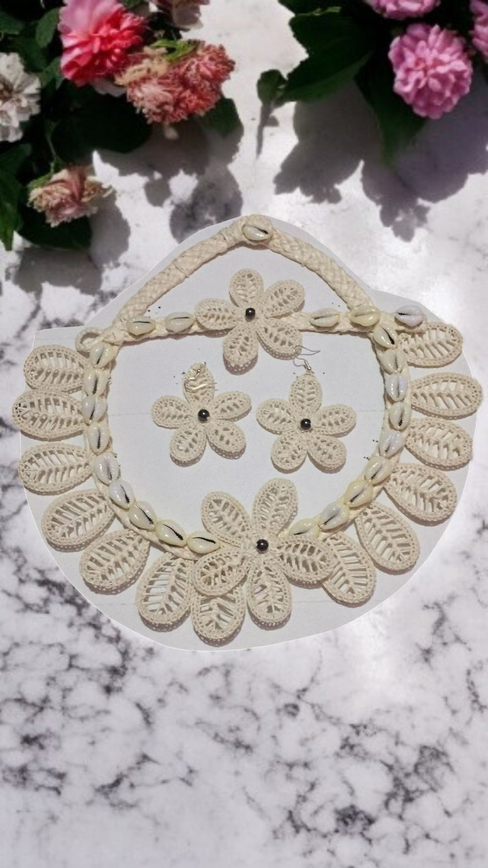 White necklace set with earrings and bracelet