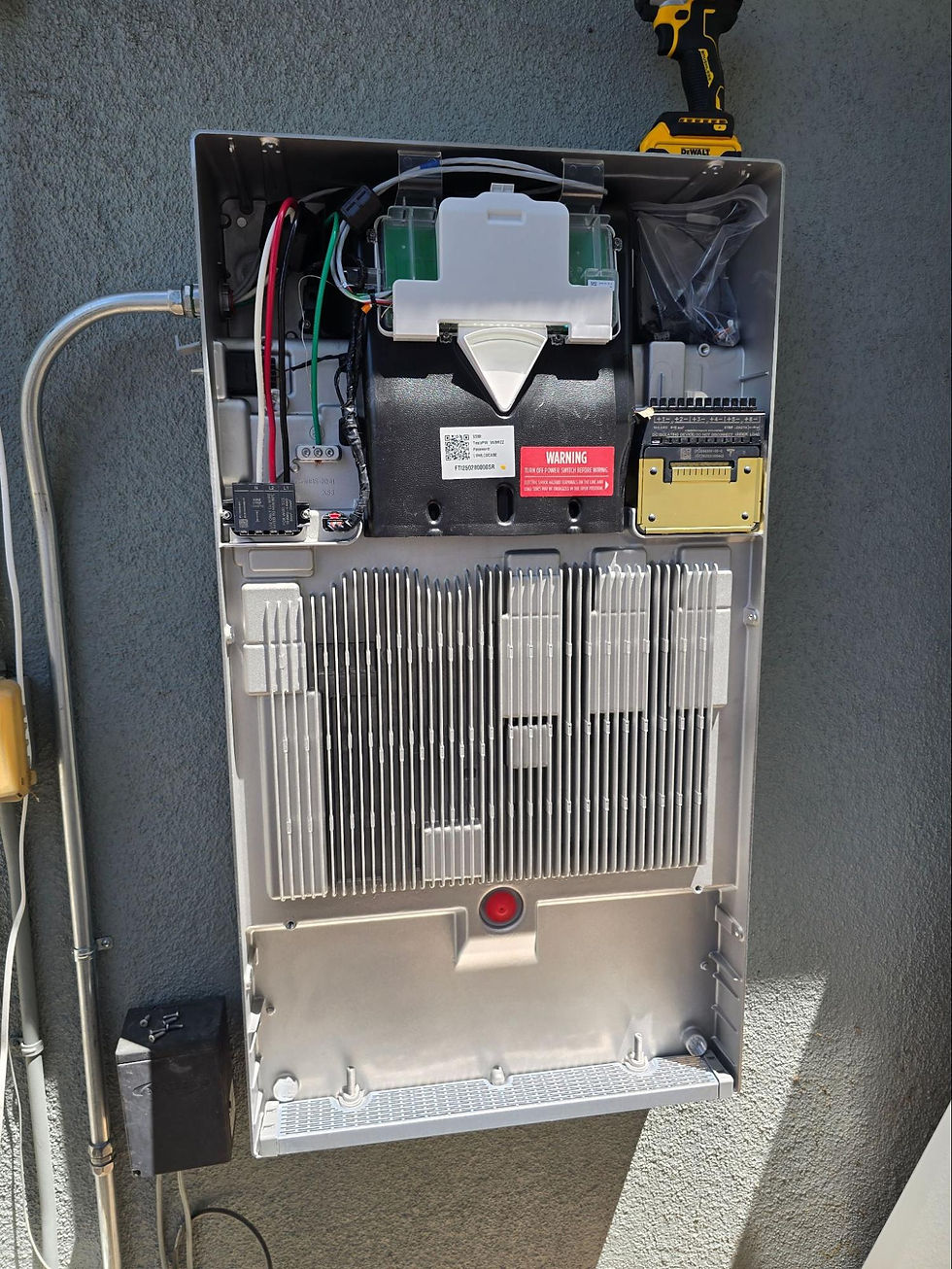 Close-up of a solar battery system panel showing wiring, inverter connections, and energy storage components