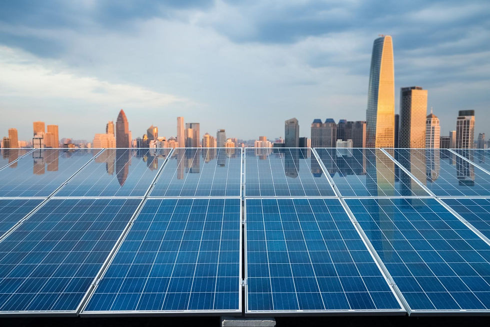 Solar panels generating electricity on a rooftop with a city skyline at twilight
