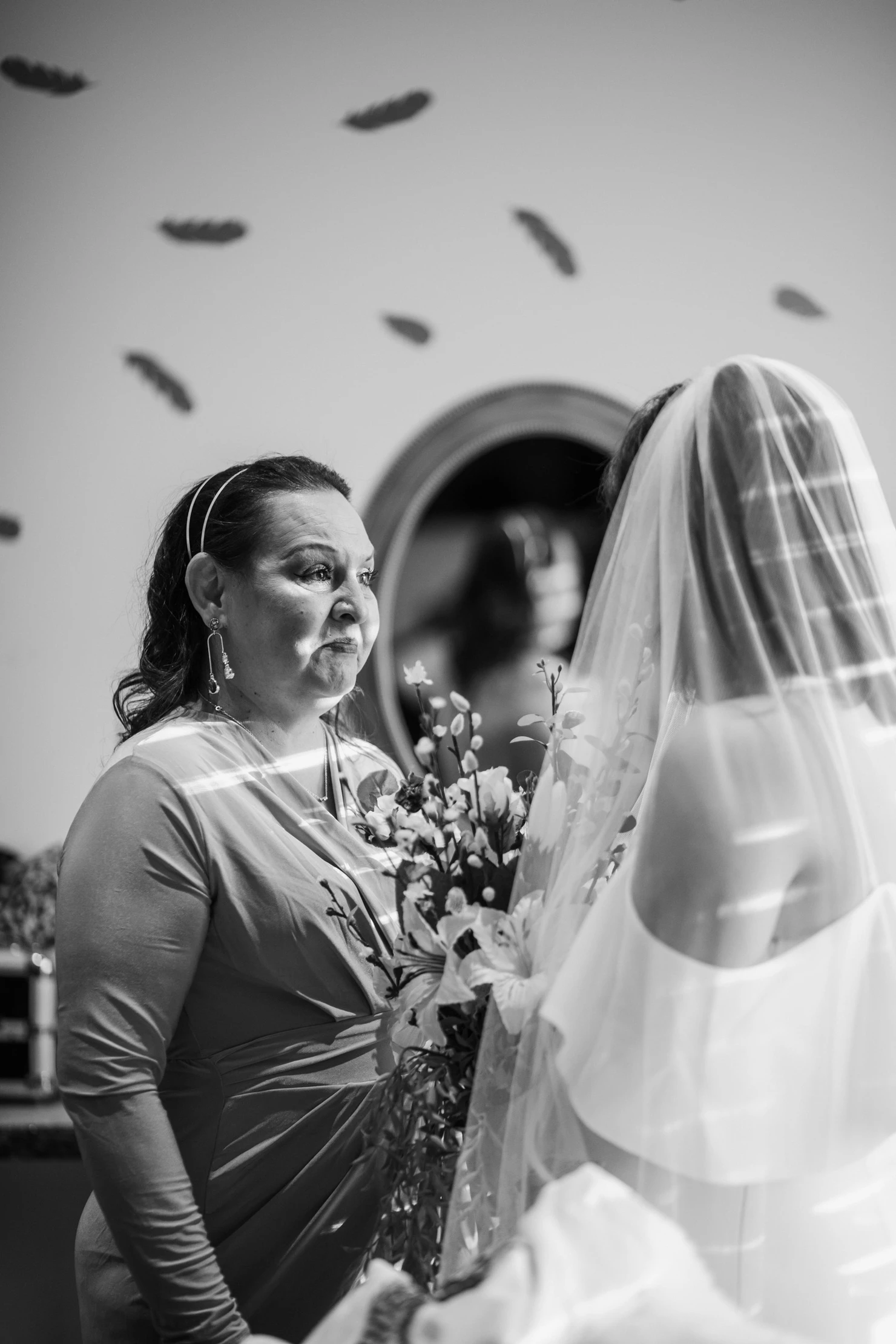 mother of bride seeing bride in wedding dress and tearing up at woodlands colorado wedding