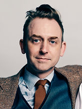 Alex and Olmsted Couch_edited.jpg