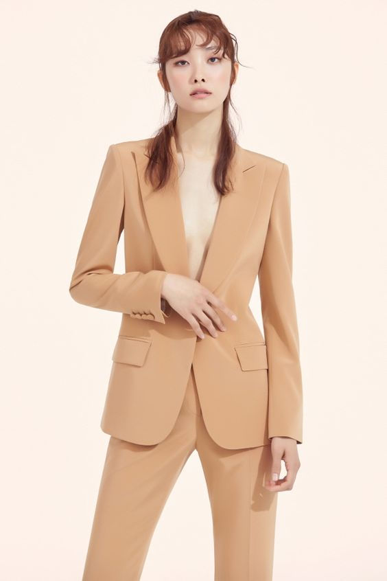 White, Cream Suit Female