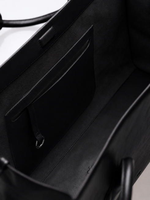 MATEO handcrafted leather tote bag in black - inside detail with pocket and o ring for you to clip your keys.