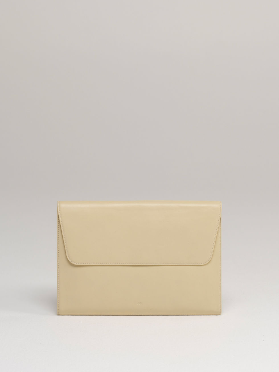 CLEO maxi envelope leather clutch in soft butter cream leather - front view