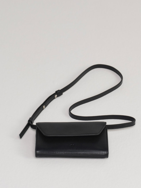 PALOMA leather cross body bag and clutch in black