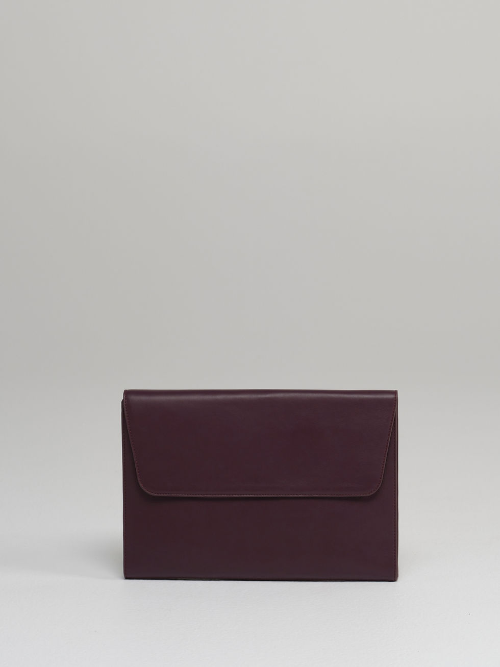 CLEO maxi envelope leather clutch in rich fig leather - front view