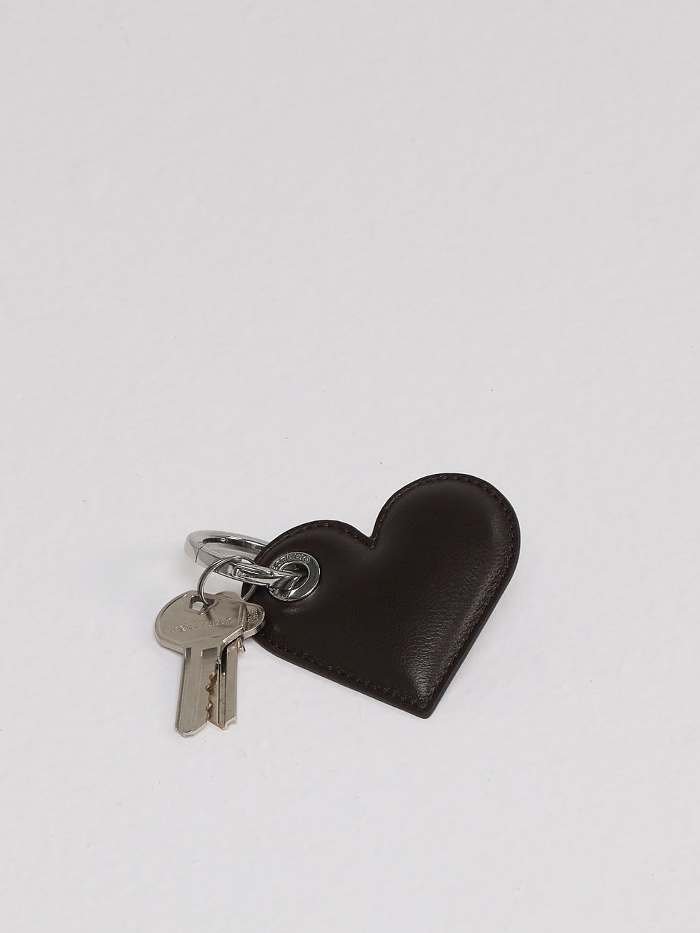 LOLITA heart-shaped leather key ring in rich chocolate brown with keys for scale