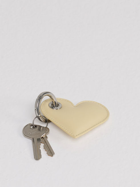 LOLITA heart-shaped leather key ring in soft butter cream with keys for scale