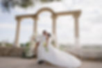 Bride and groom kissing at their destination wedding in Spain Alicante