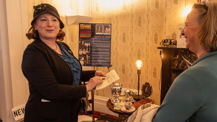 Actor talks to audience member 