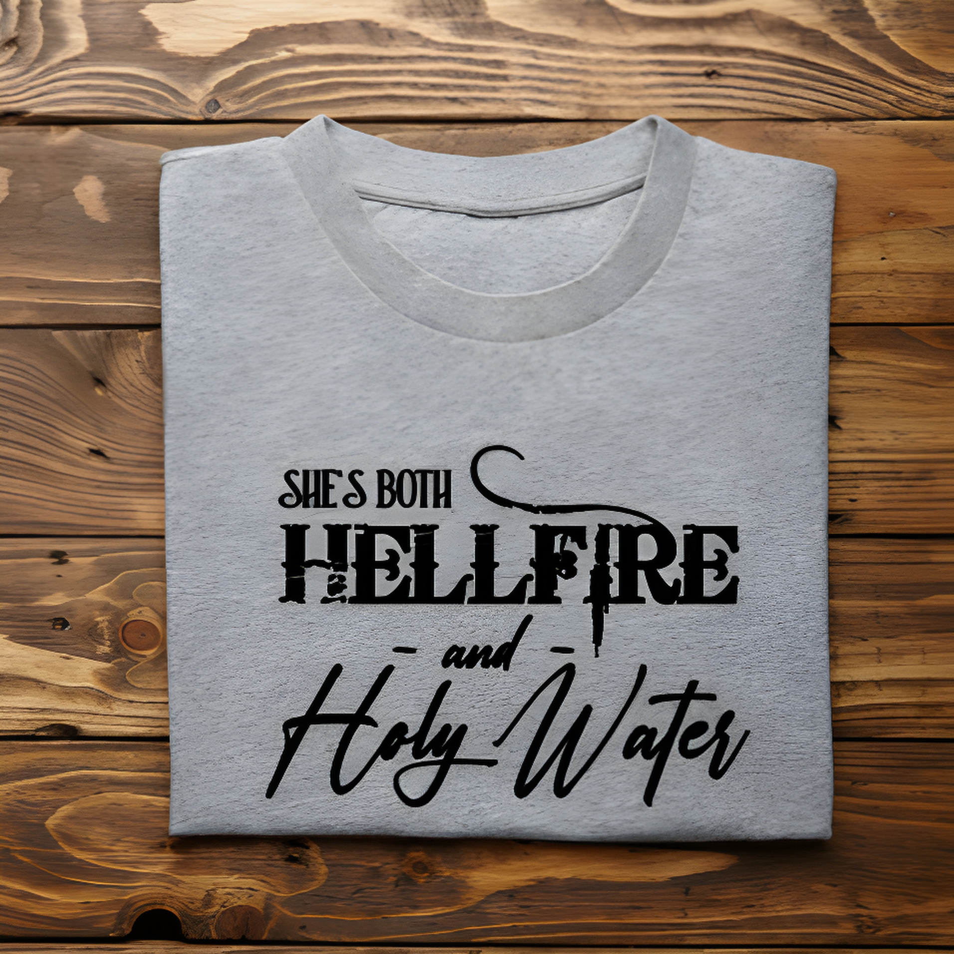 A black decal that says: She's both hellfire and holy water