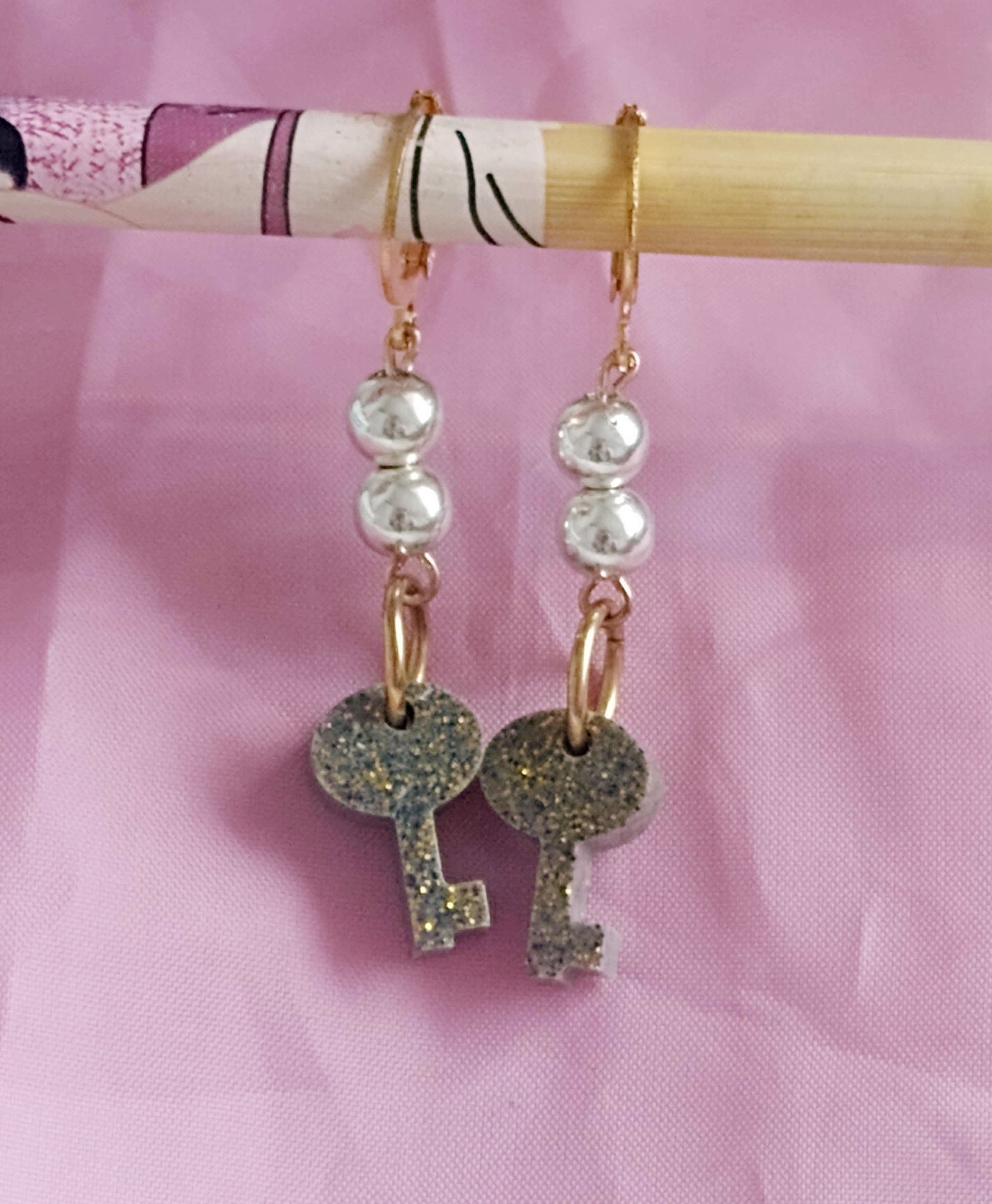Aretes, pendientes Resina