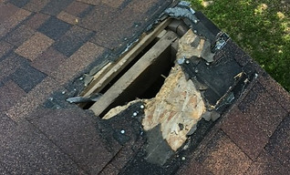 Raccoon-Hole-Roof-Kansas-City-MO.jpg