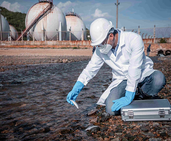squash_scientist-examining-water-sample-near-industrial-a-2026-09-24-06-53-09-utc.jpg