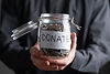 person-holding-glass-jar-with-metal-coins-money-donations-concept.jpg