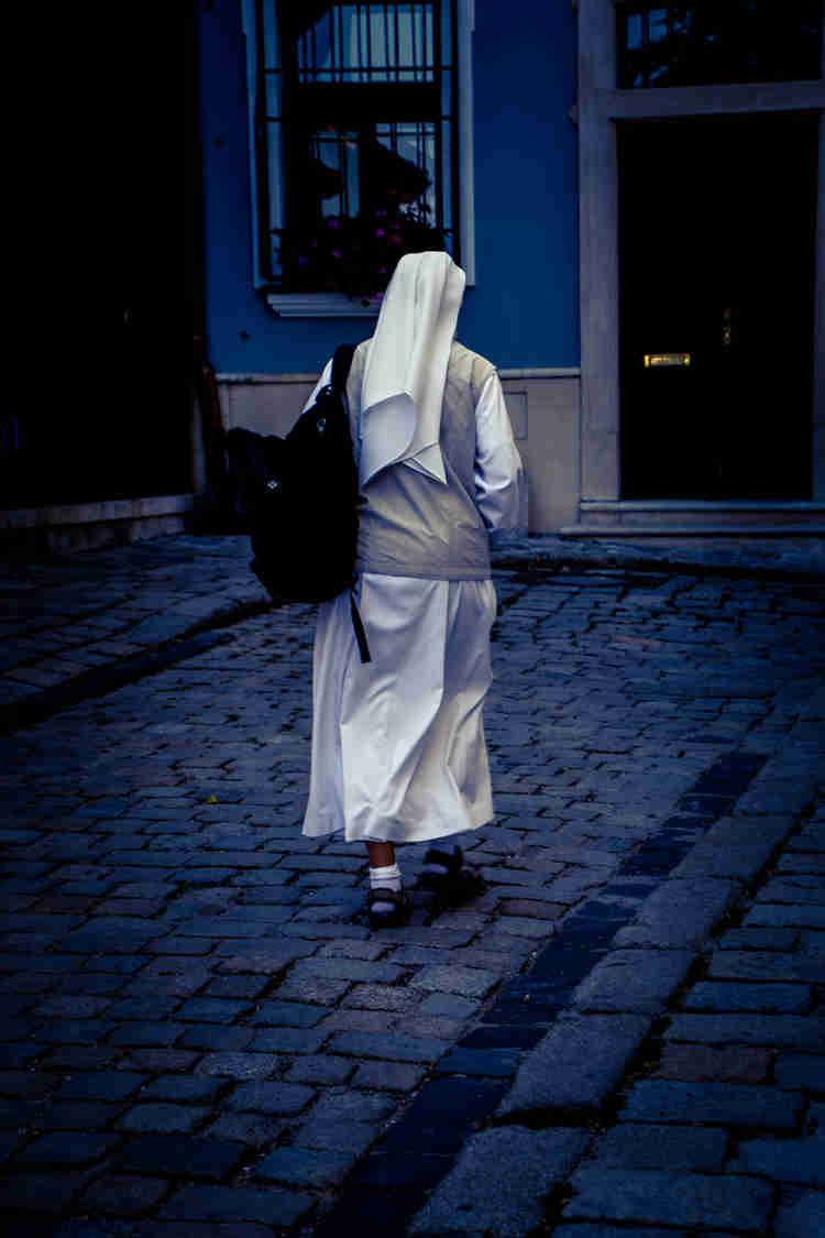 Image of nun walking in street in Bratislava, Slovakia