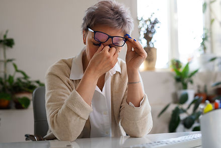 medium-shot-woman-sitting-desk.jpg