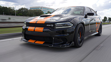 Hellcat with custom stripes, calipers wrap and decals on this Dodge Charger
