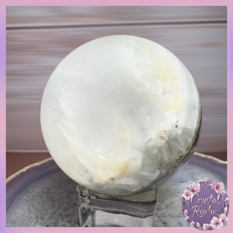 縮圖：White Fluorite Sphere with Pyrite & Mica