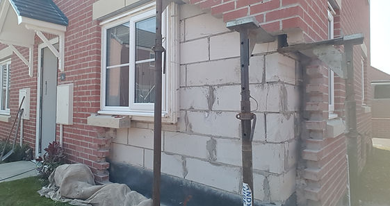 The corner of a house being rebuilt by Abbeydale Builders Bridlington after suffering impact damage