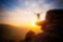 ELEVATE Conference featuring a man on a mountaintop at sunrise