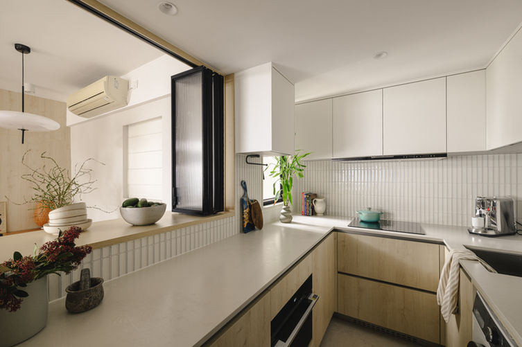 Semi open kitchen design by Apartmentary