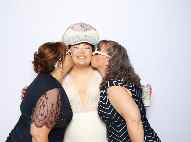 A high quality print, with a glam photo booth capture of the bride and wedding guests at a wedding in Coeur d'Alene, Idaho.