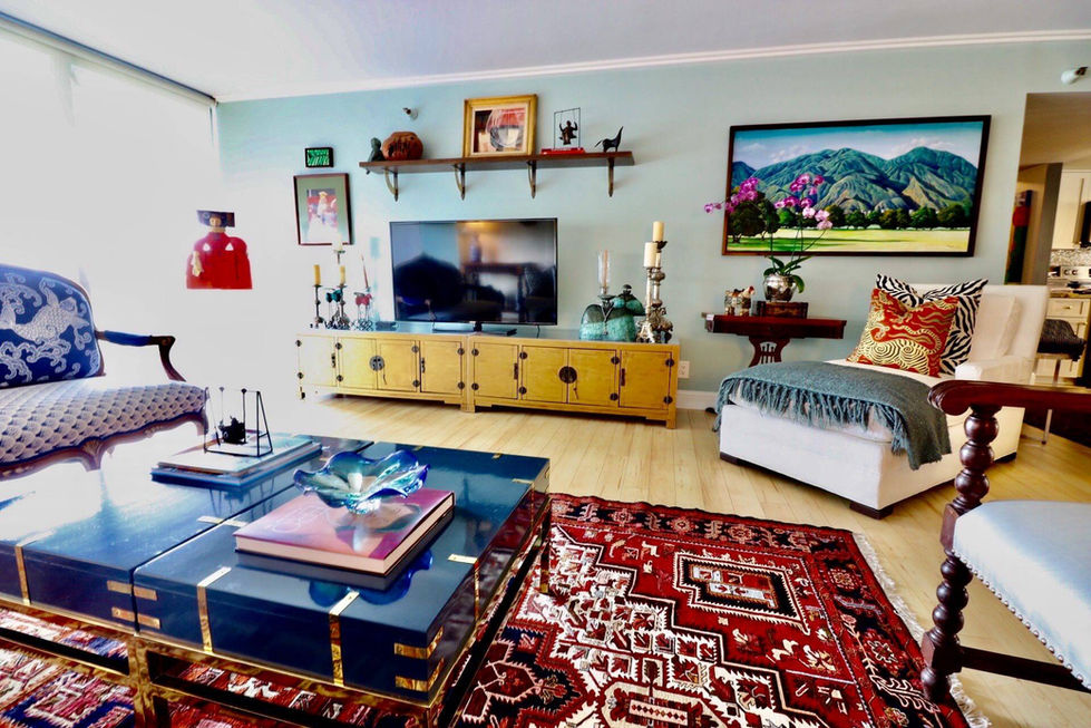 Colorful creative living space with playful accents and eclectic furnishings by a Miami interior designer