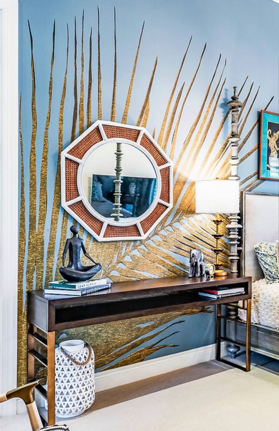 Statement console vignette in Miami featuring geometric mirror, bold art, and curated modern decor