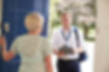 Man at door with clipboard.jpeg
