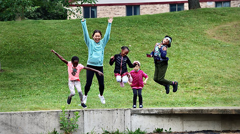 volunteer webiste top- Claire_AW_GBC_Kids_Jump.JPG