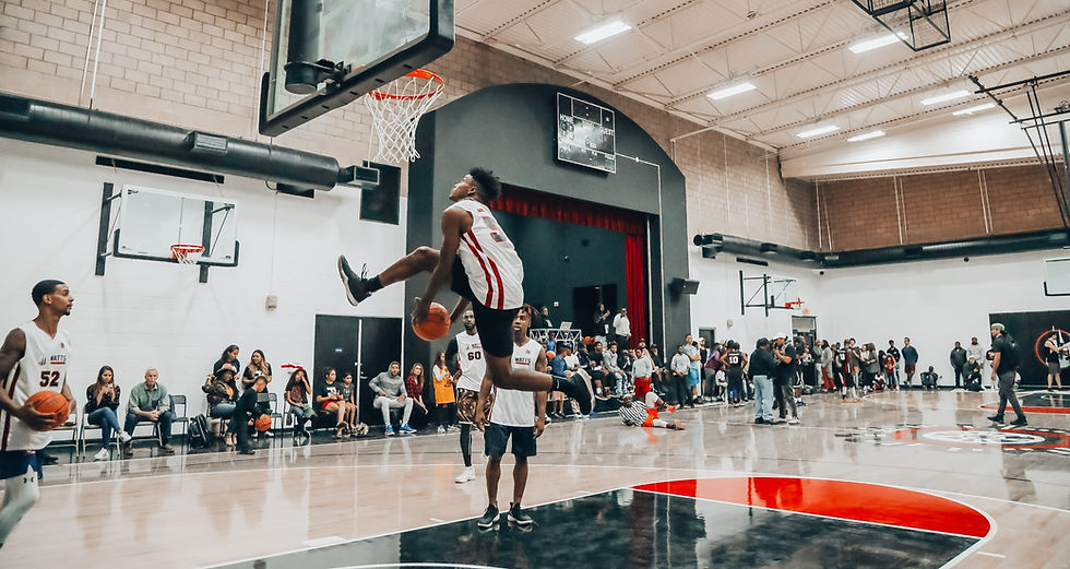 people playing basketball inside basketball court_edited.jpg