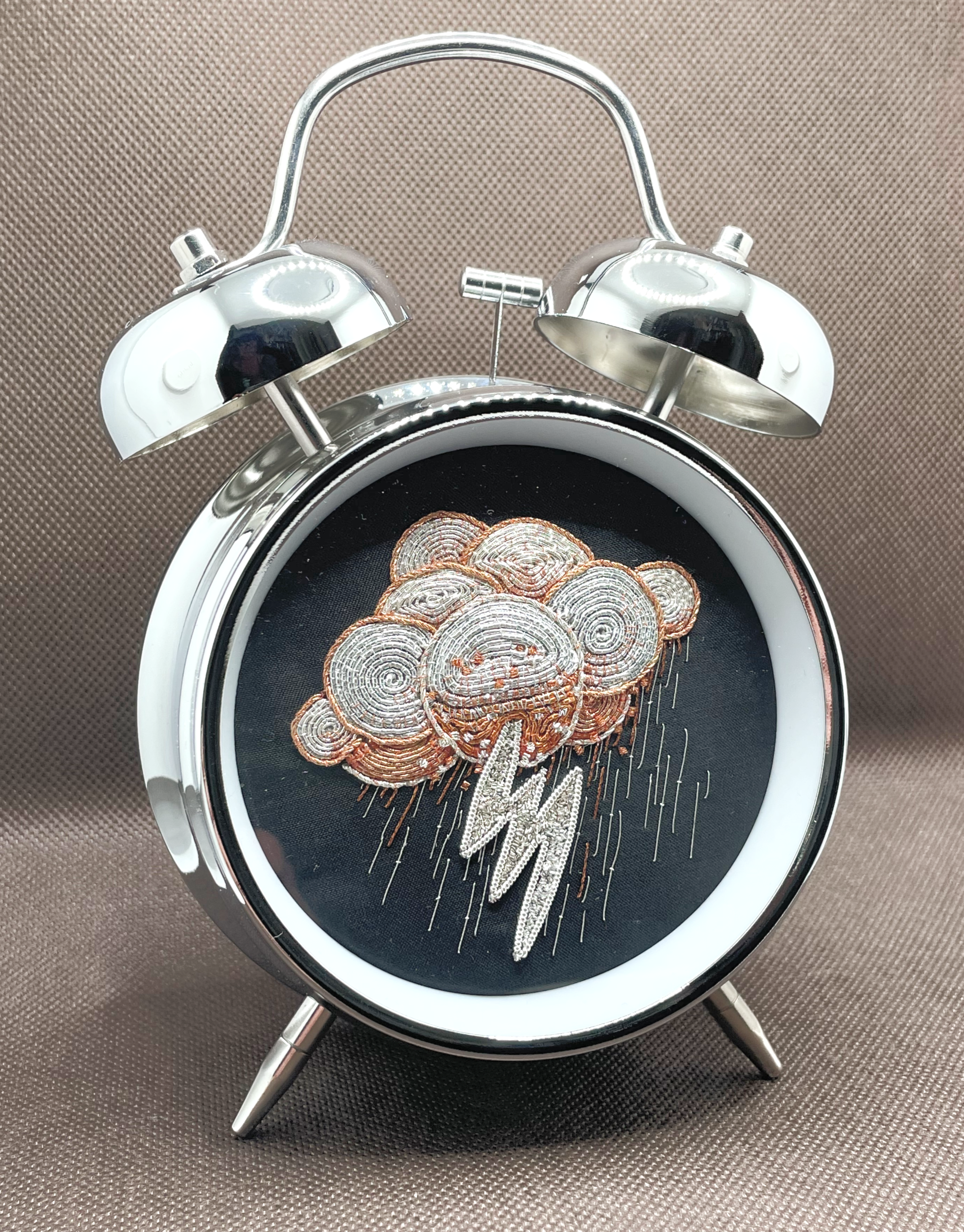 "Climalarm" metalwork embroidery