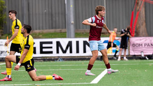Presley Ortiz celebrating in front of Spirits players