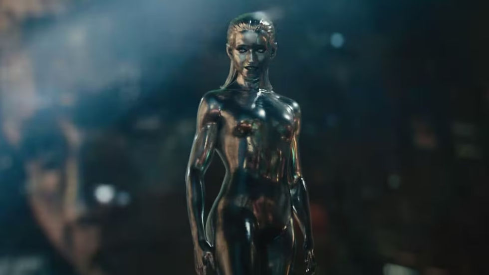 Metallic humanoid figure standing with a reflective surface. Blur in the dark background adds a mysterious, futuristic feel.
