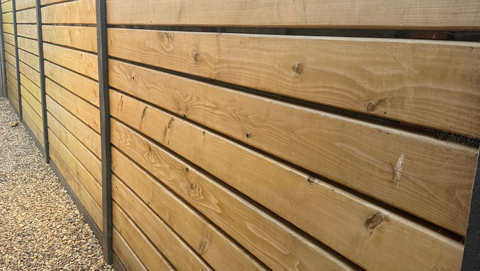 wooden fence which has weathered
