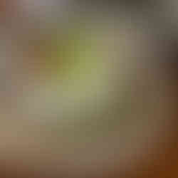 A seafood hot pot platter in Phu Quoc with shrimp, squid, fish, and fresh vegetables arranged on a large plate.