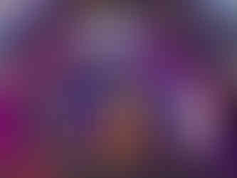 Performers posing under the neon Kiss of the Sea sign in Phu Quoc.