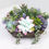 Thumbnail: Small dough bowl filled with wooden succulents 