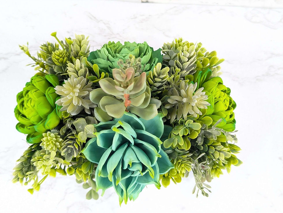 Thumbnail: Green succulent arrangement in wood flower form