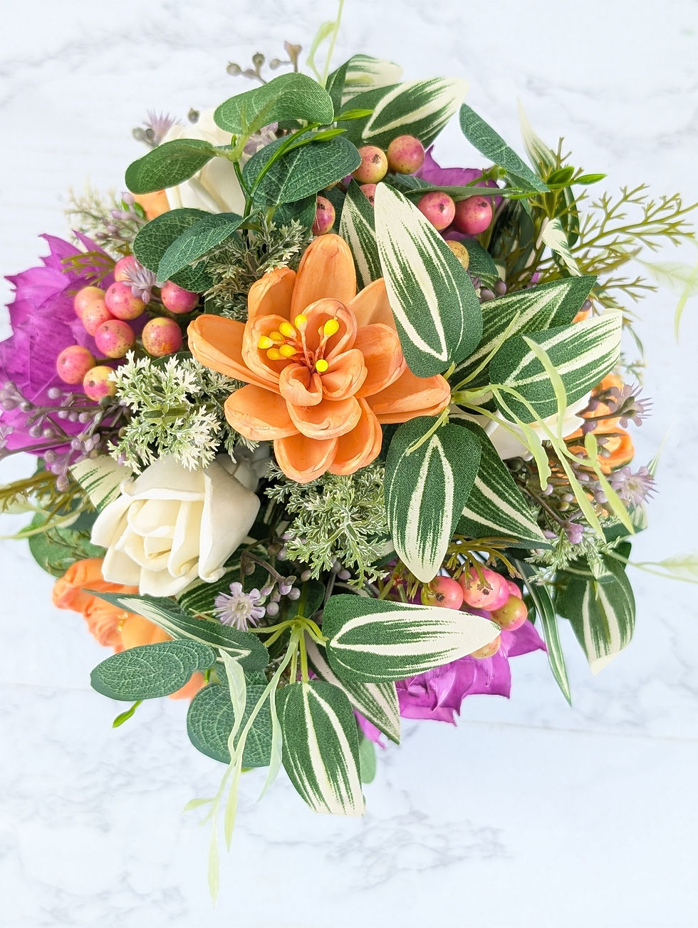 Peach and white sola flower arrangement