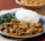 Ugali served with Kale and Mutton chops. 
