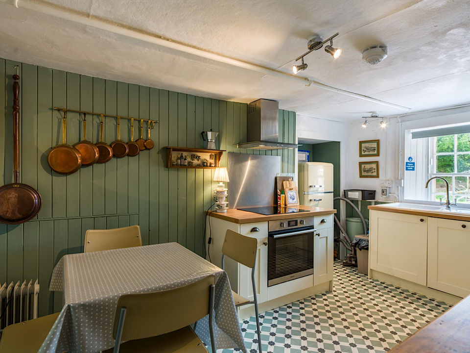 Small kitchen with a table and chairs
