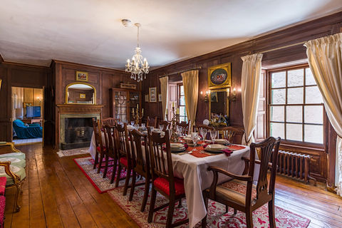 Dining room with a long table running down the centre